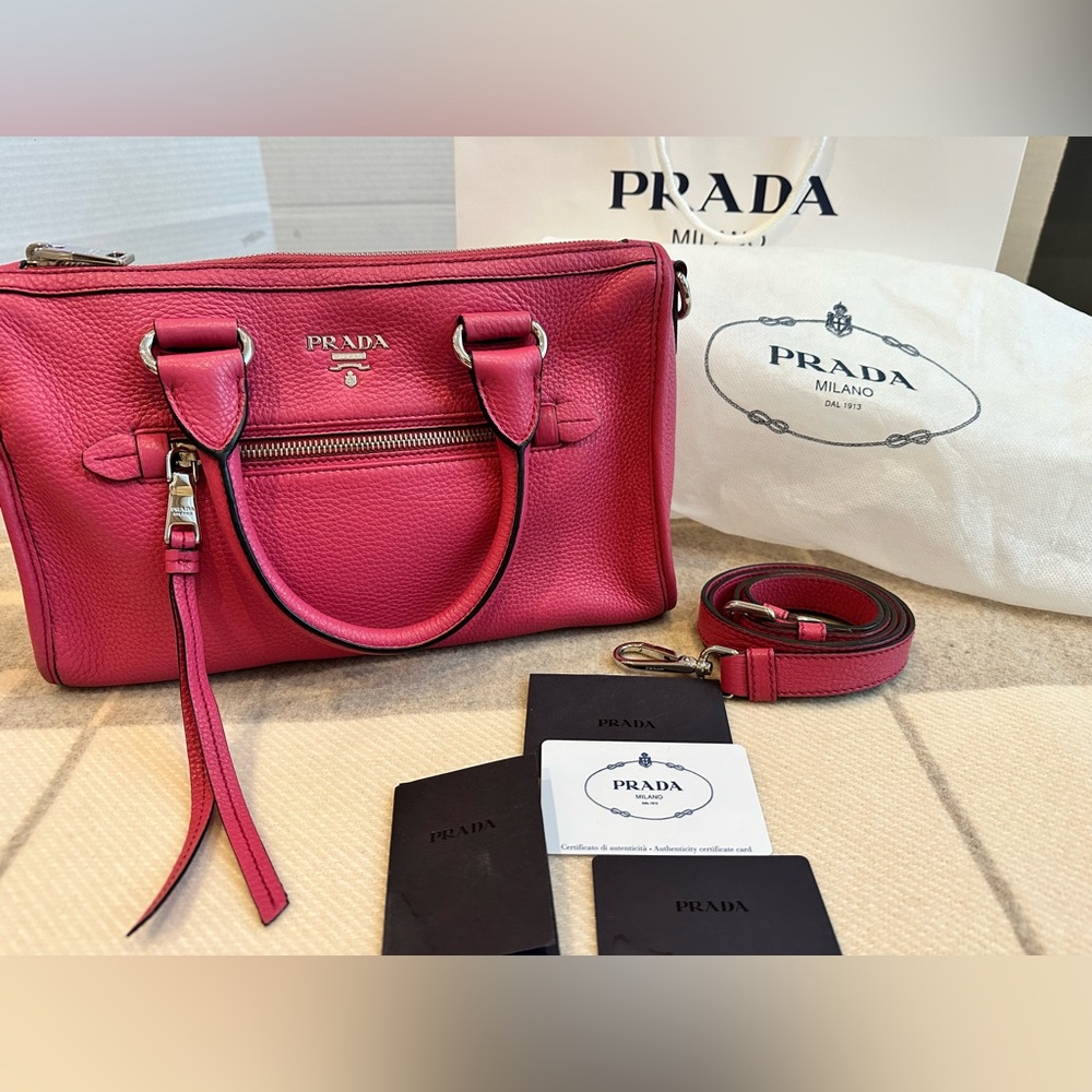 Prada top handle/crossbody bag in peony color